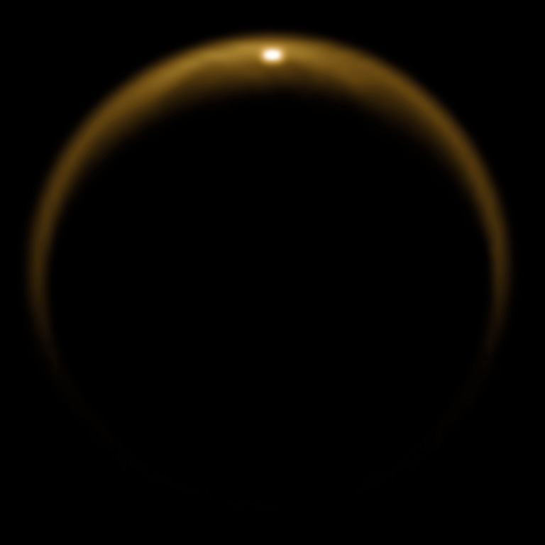 El Sol es reflexa als oceans de Tità